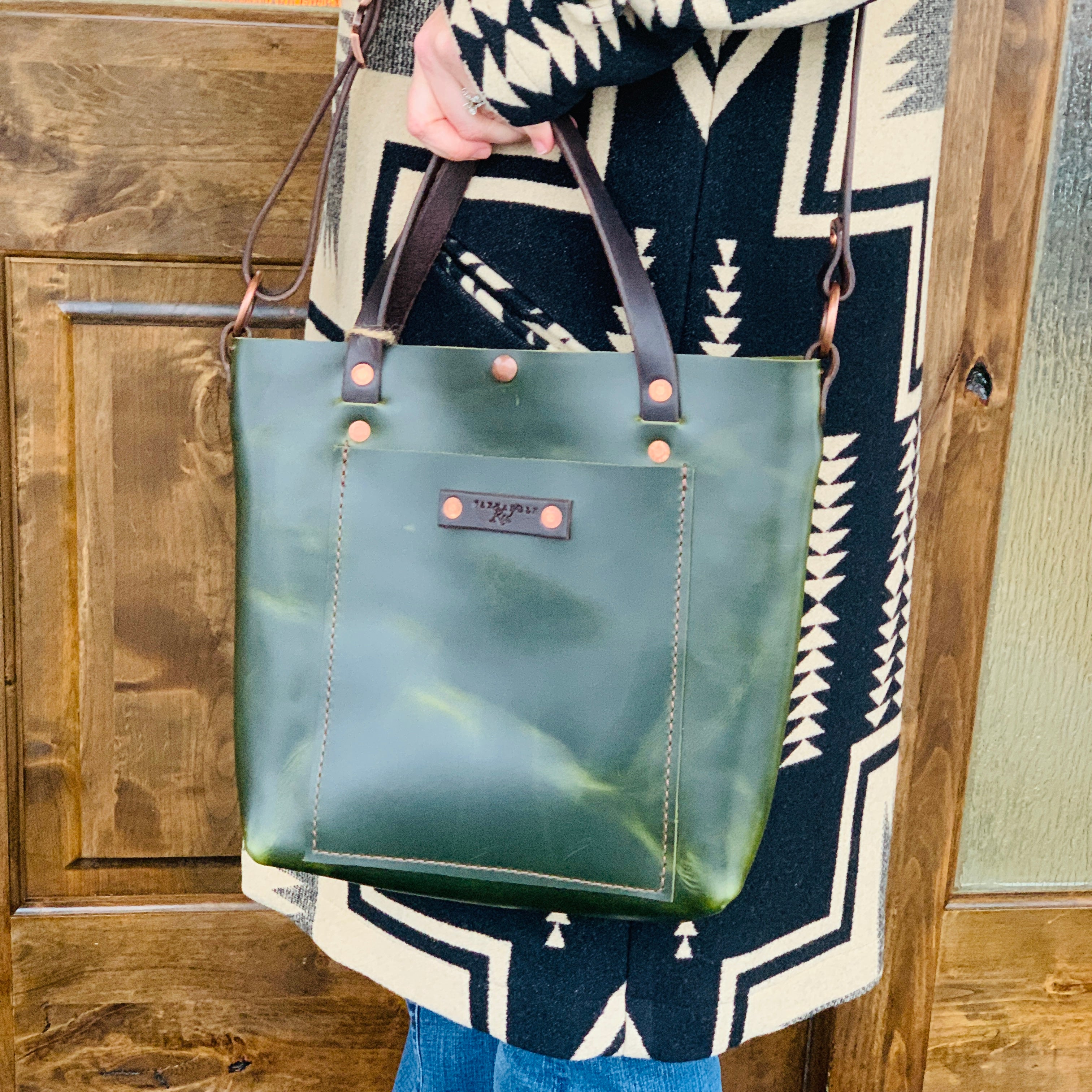 green purse handcrafted messenger bag handbag sale western store leather items gift shopping ideas event space silo store celebration