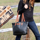 black leather carry on tote bag purse messenger bag lake coeur d'alene post falls north idaho spokane store jewelry shop boutique handcrafted gift birthday special occasion mother's day ideas post falls handcrafted