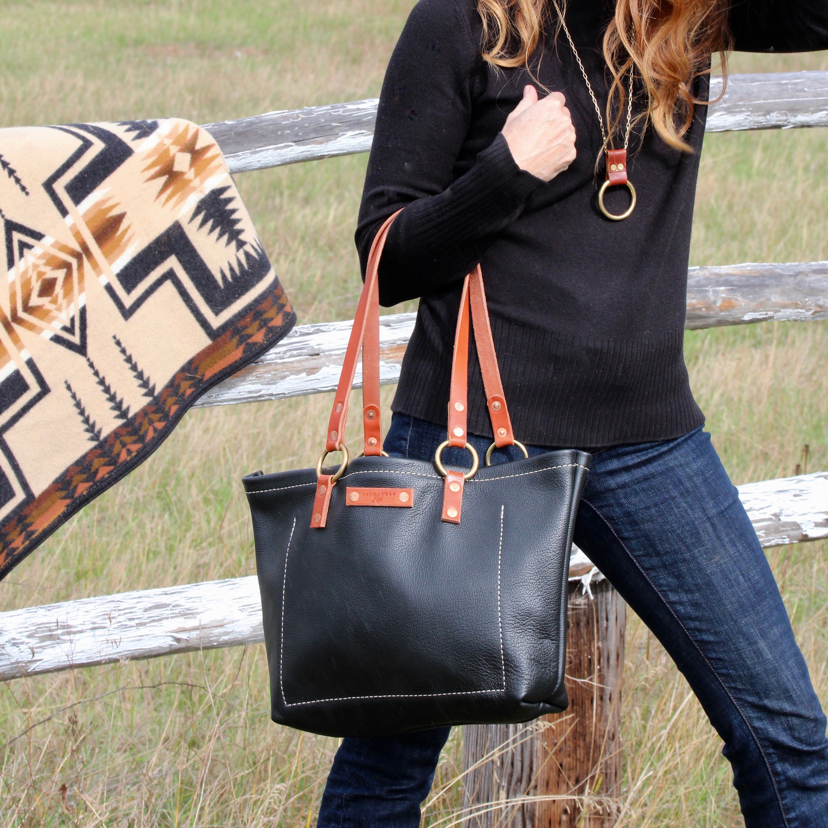 black leather carry on tote bag purse messenger bag lake coeur d'alene post falls north idaho spokane store jewelry shop boutique handcrafted gift birthday special occasion mother's day ideas post falls handcrafted