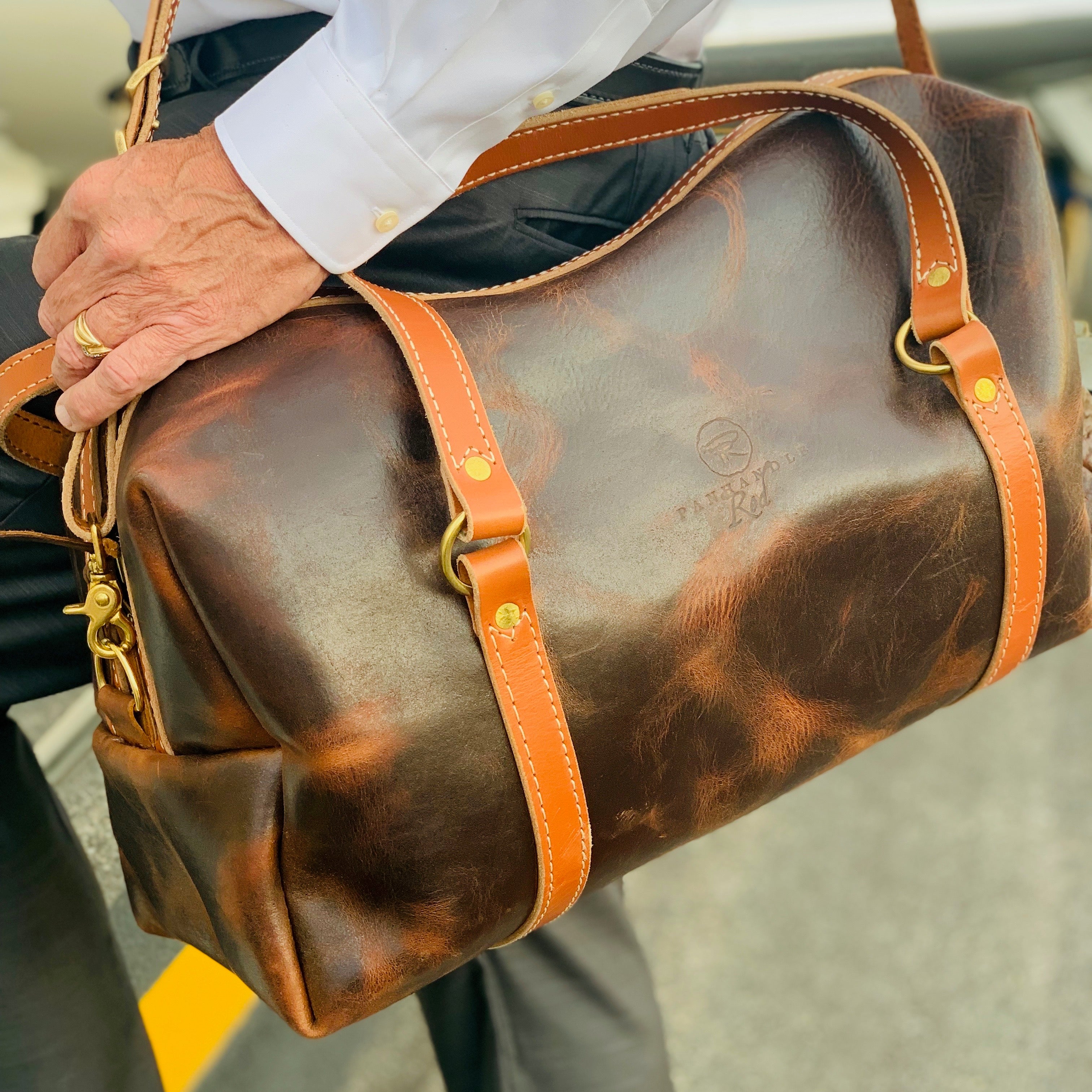 Panhandle Red Company specializing in Leather Goods, Handbags, Totes, Purses, Everyday Carry Needs, and more. Full-grain leather items, custom gifts, all Handcrafted in Idaho, USA.